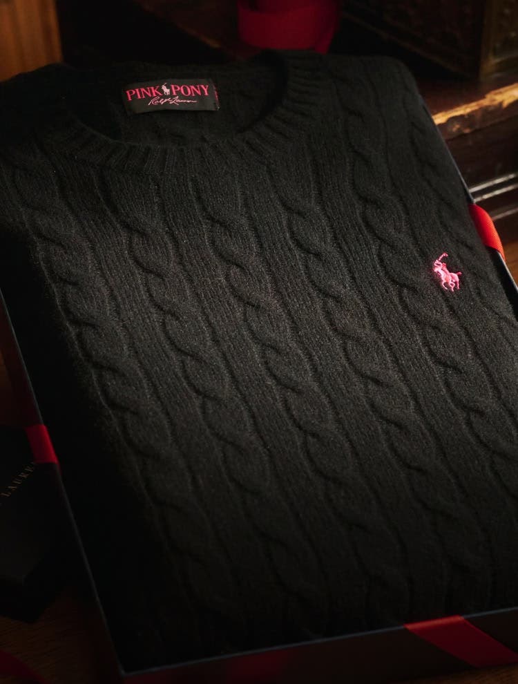 Black cable knit jumper with pink pony polo player logo 